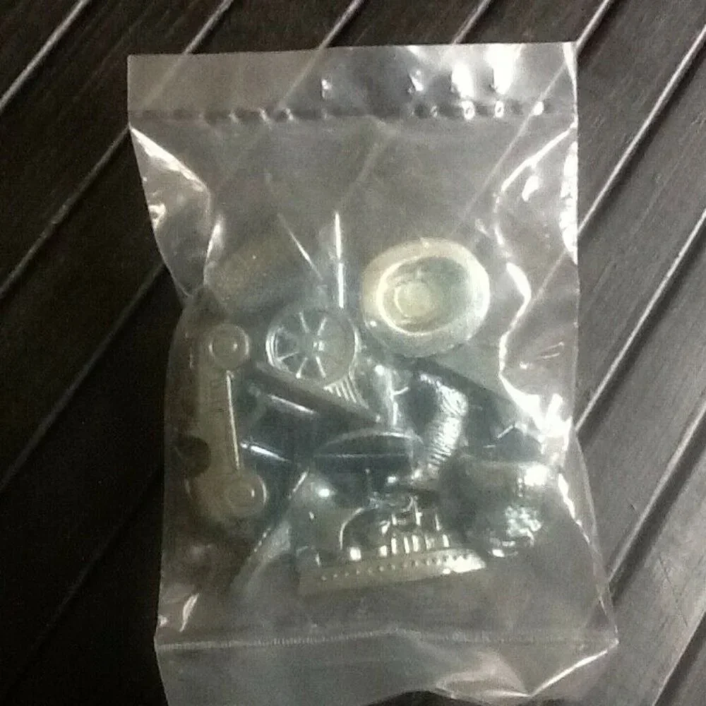 NEW Sealed Package of Monopoly Game Playing Pieces